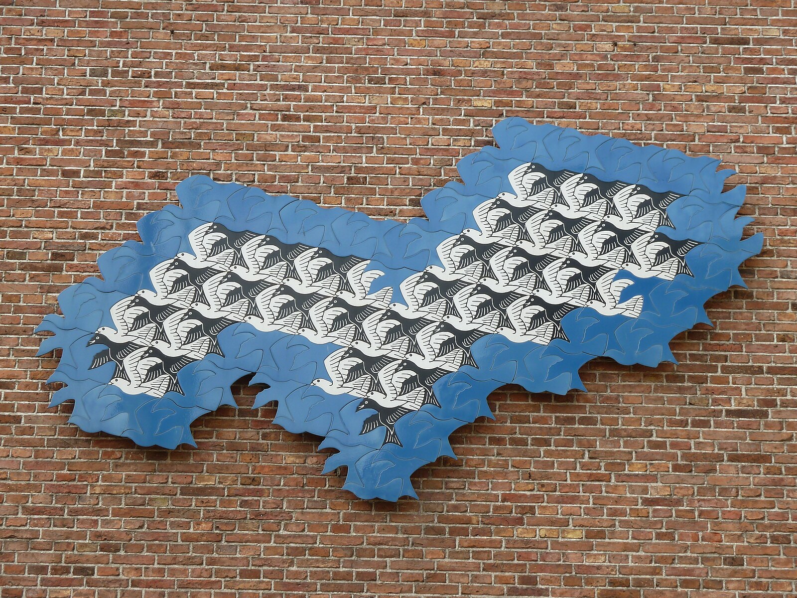  Wall tableau of a tessellation by local resident M. C. Escher on the Princessehof ceramic museum, Leeuwarden. 
